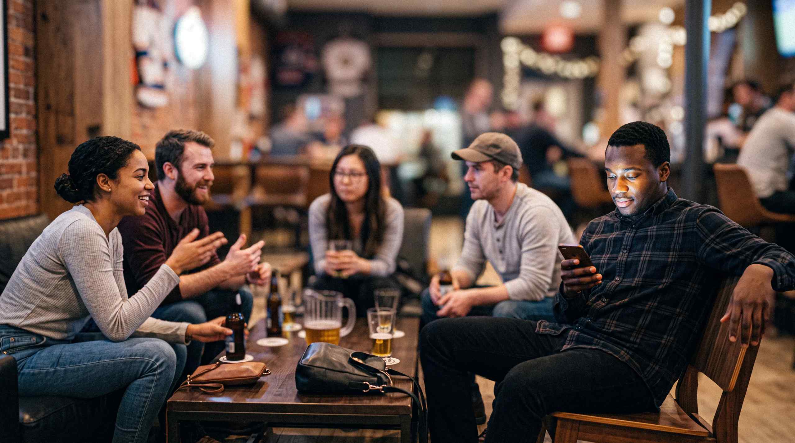 people sitting around with drinks